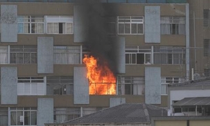 Mulher morre após tentar escapar de incêndio e cair da janela 