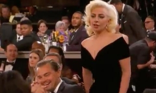 Cara de deboche de Leonardo Di Caprio para Lady Gaga vira meme