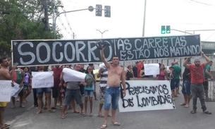 População faz manifestação após morte de vítima de acidente entre carreta e carro em Manaus