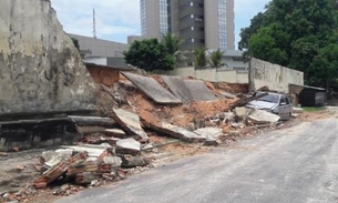 Muro do TJAM desaba sob carro durante temporal em Manaus