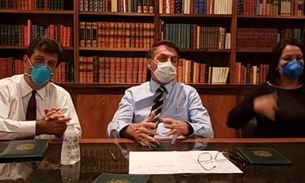Com máscara, Bolsonaro pede que manifestação seja repensada após chamar coronavírus de ’fantasia’