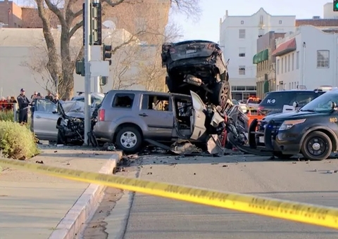 A 13-year-old fleeing the police in a stolen car kills one person and injures 12.